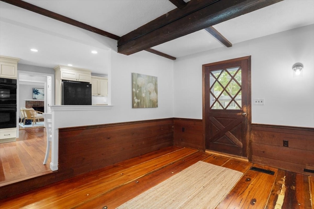 48 Knollwood Road Norwell, MA 02061 - Photo 6 of 41 a view of a living room and a flat screen tv