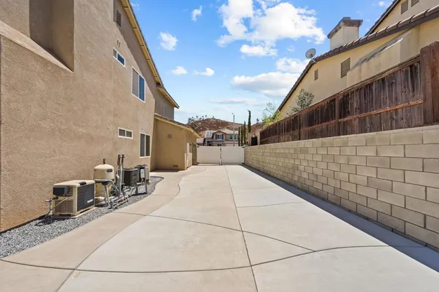 a view of a swimming pool and lounge chair