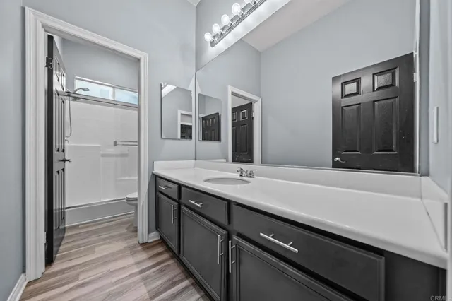 a swimming pool with outdoor seating and yard