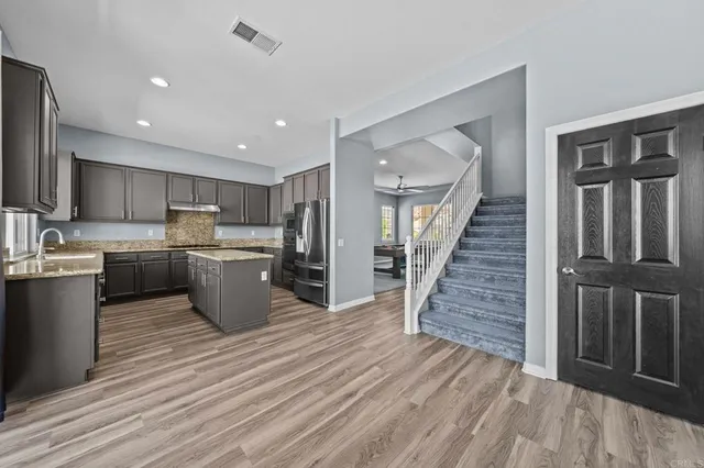 a view of swimming pool from a lounge chair