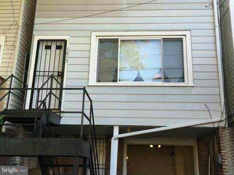 1015 Quebec Place Northwest Washington, DC 20010 - Photo 14 of 15 a view of a house with a window