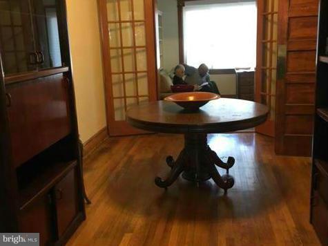 1015 Quebec Place Northwest Washington, DC 20010 - Photo 5 of 15 a view of a living room with furniture and a floor to ceiling window