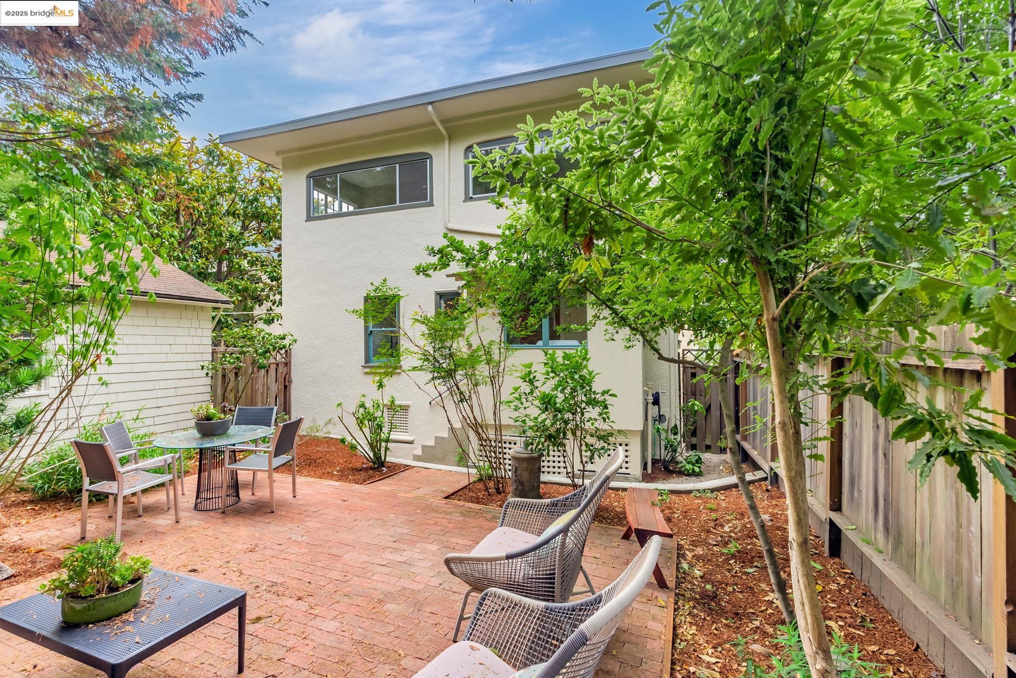 971 Santa Barbara Road Berkeley, CA 94707 - Photo 11 of 37 a view of a backyard with sitting area