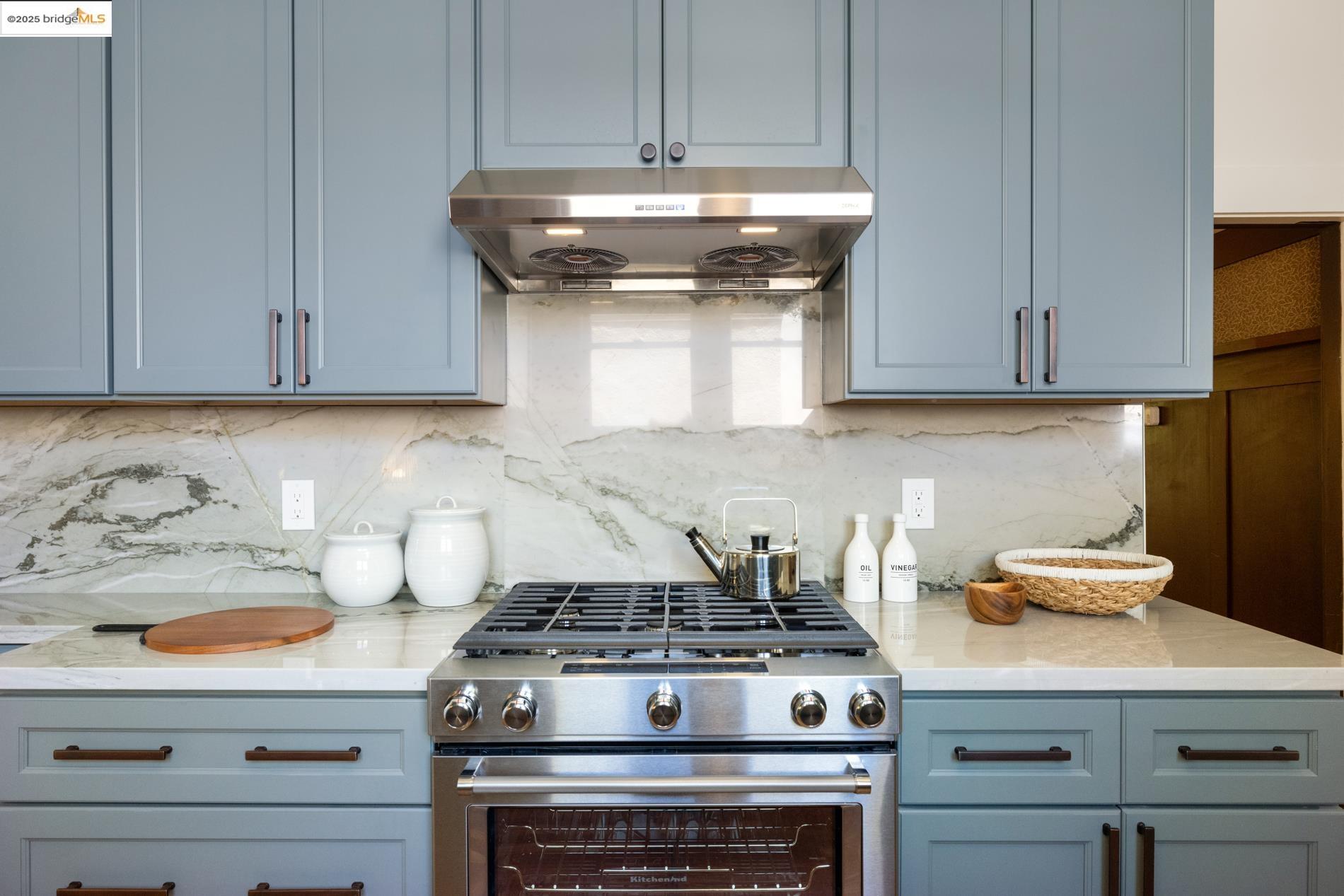 971 Santa Barbara Road Berkeley, CA 94707 - Photo 5 of 37 a stove top oven sitting inside of a kitchen