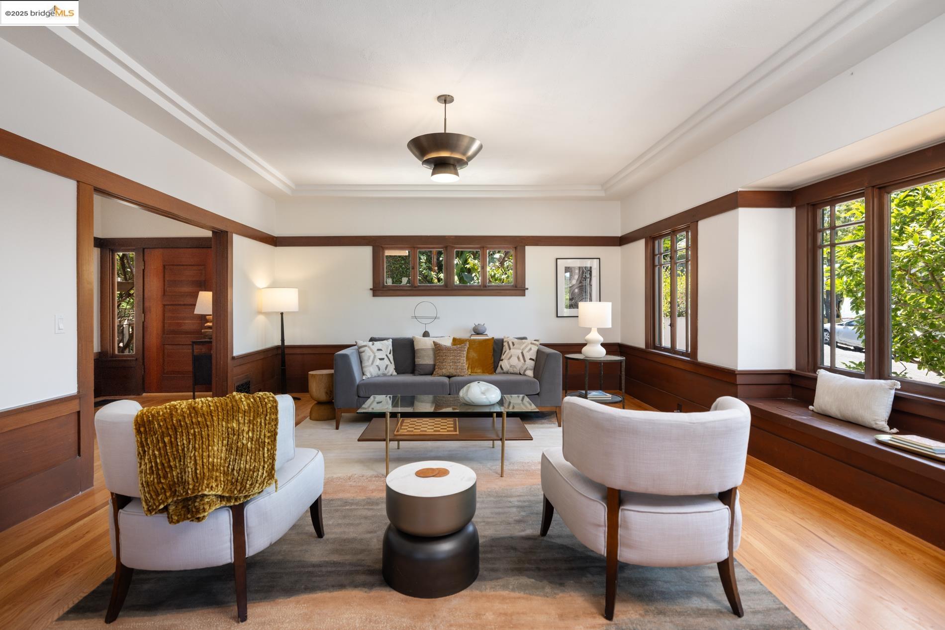 971 Santa Barbara Road Berkeley, CA 94707 - Photo 9 of 37 a living room with furniture and a large window