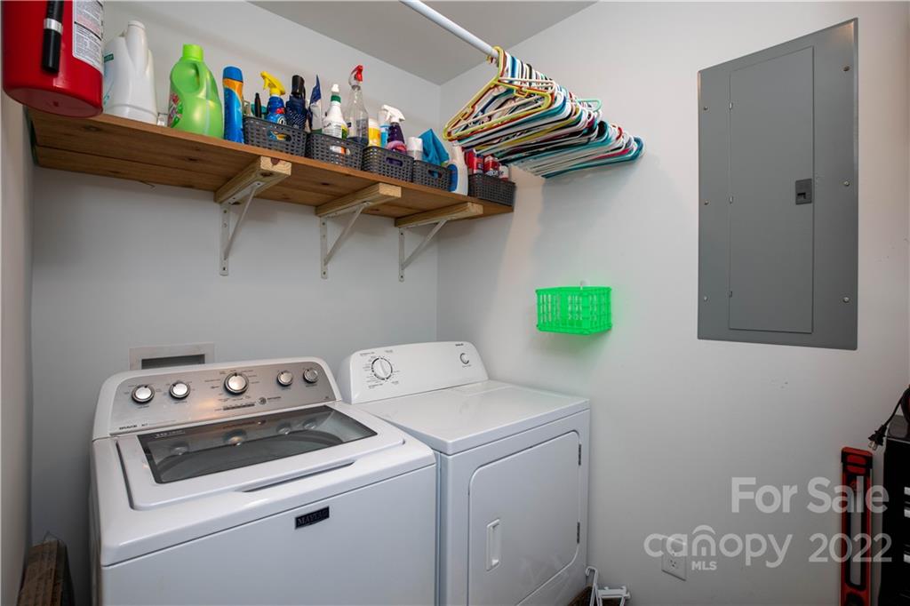 2993 Greenleaf Road Clover, SC 29710 - Photo 14 of 27 a utility room with dryer washer and a wooden floor
