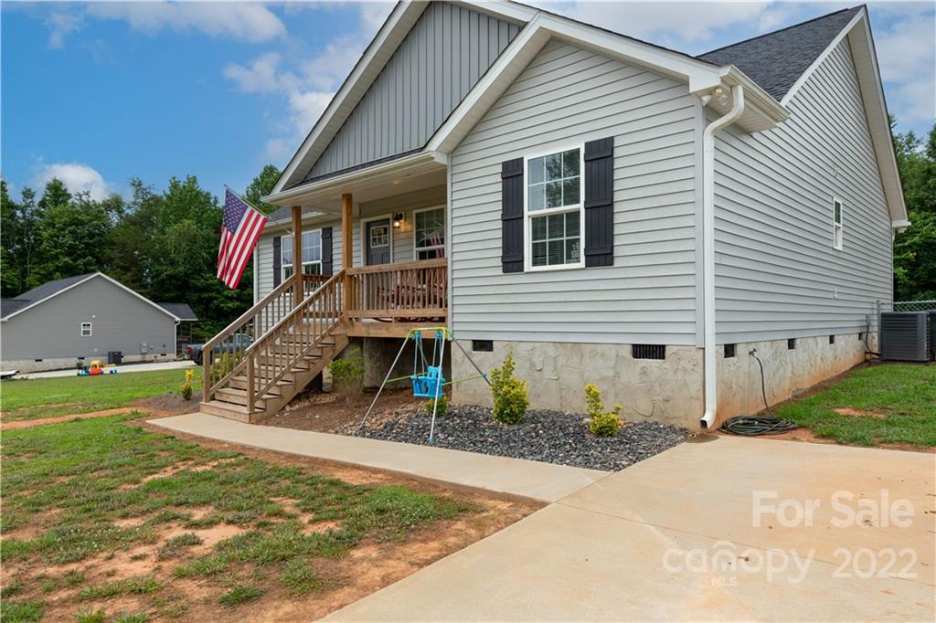 2993 Greenleaf Road Clover, SC 29710 - Photo 20 of 27 a front view of a house with a yard