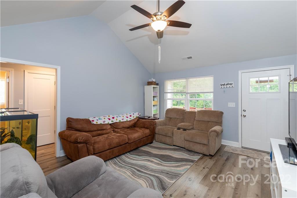 2993 Greenleaf Road Clover, SC 29710 - Photo 2 of 27 a living room with furniture ceiling fan and a window