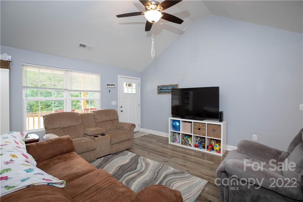 2993 Greenleaf Road Clover, SC 29710 - Photo 4 of 27 a living room with furniture and a flat screen tv
