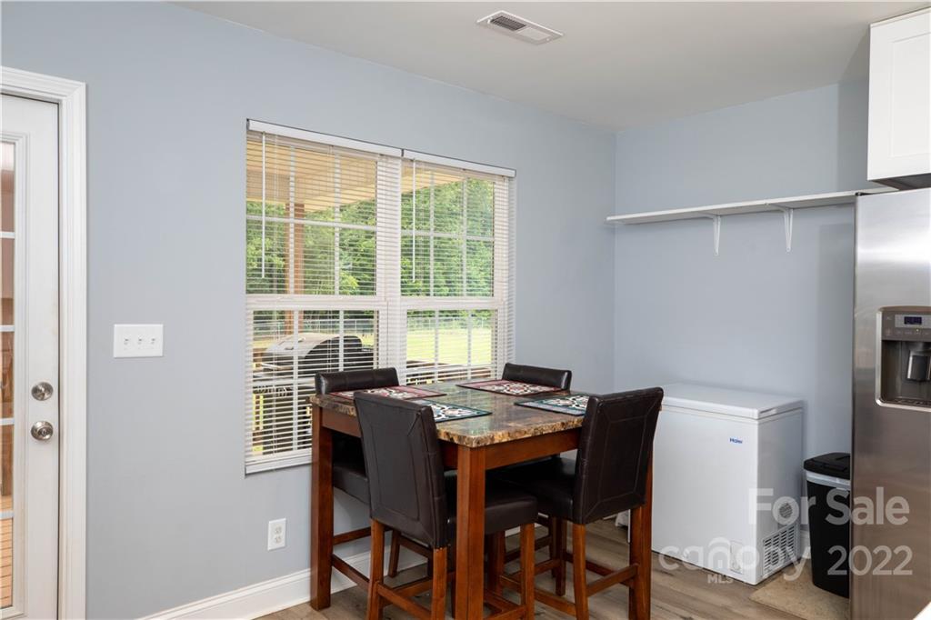 2993 Greenleaf Road Clover, SC 29710 - Photo 7 of 27 a dining room with a table and chairs