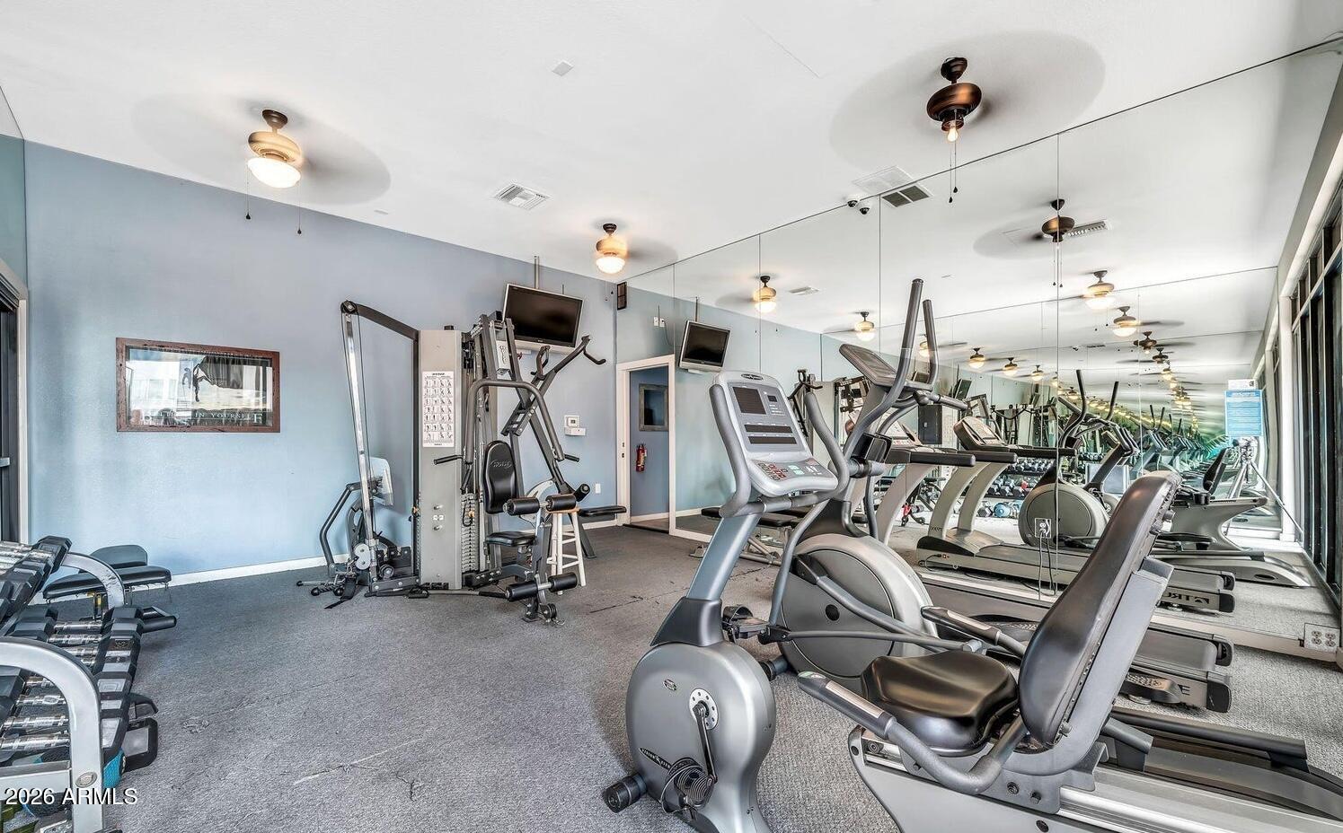 3633 North 3rd Avenue, Unit 1043 Phoenix, AZ 85013 - Photo 10 of 14 a view of a room with gym equipment
