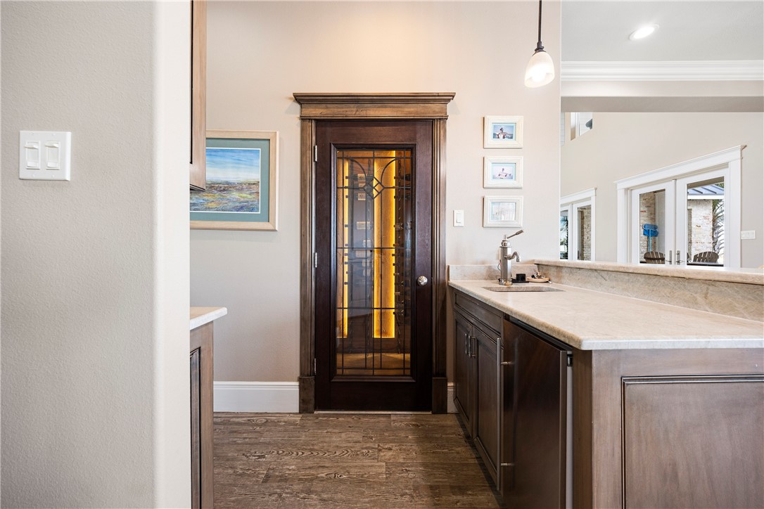 13806 Captains Row Corpus Christi, TX 78418 - Photo 11 of 40 a bathroom with a sink and a mirror