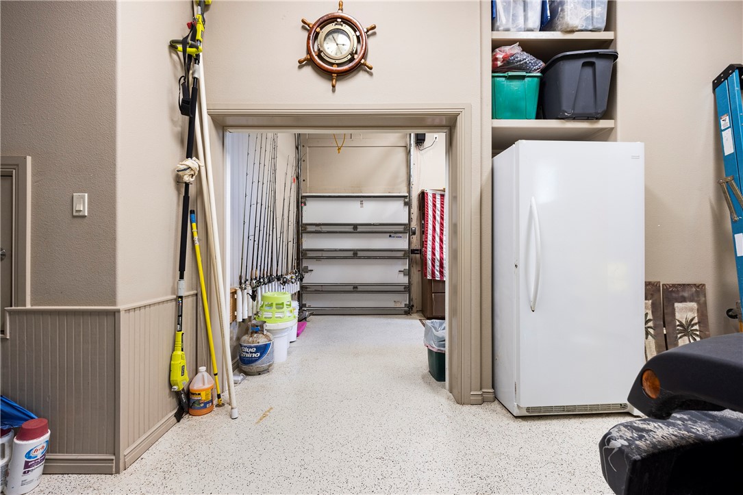 13806 Captains Row Corpus Christi, TX 78418 - Photo 37 of 40 a view of storage and utility room with stairs