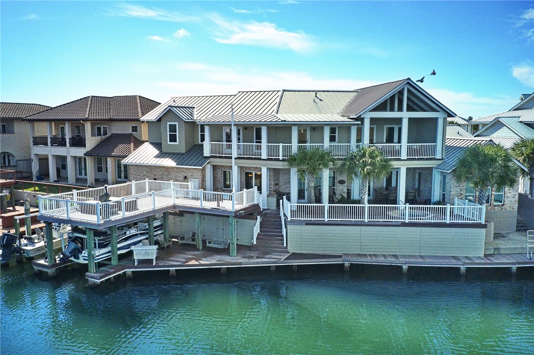 13806 Captains Row Corpus Christi, TX 78418 - Photo 38 of 40 a front view of a house with a boat
