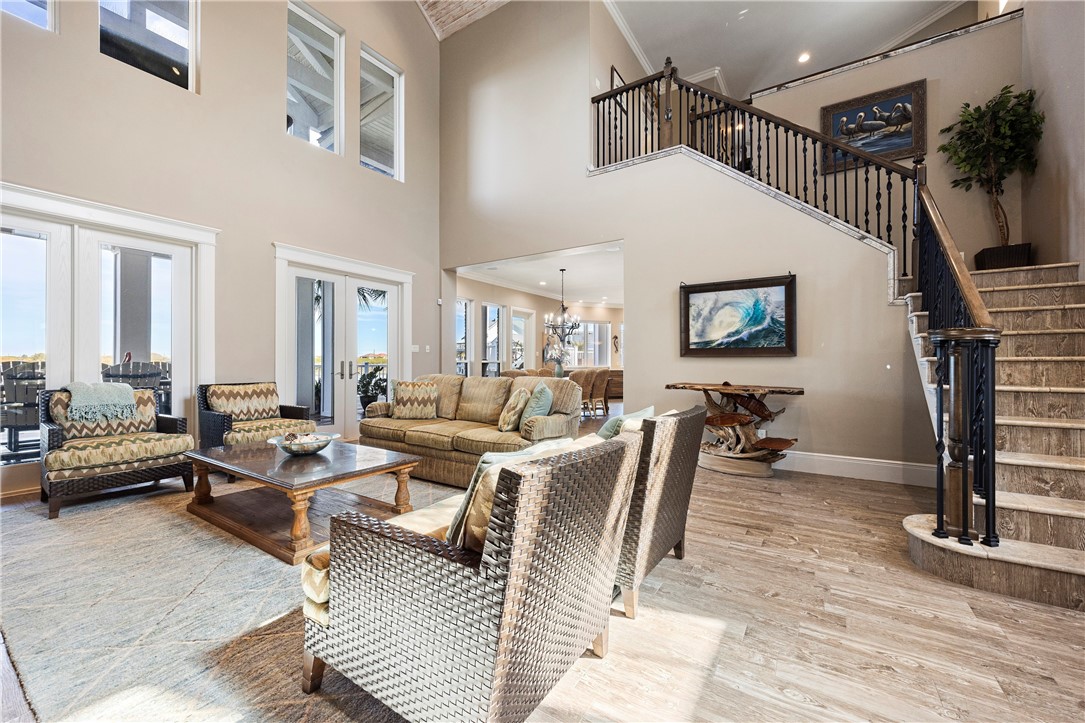 13806 Captains Row Corpus Christi, TX 78418 - Photo 5 of 40 a living room with furniture and a flat screen tv