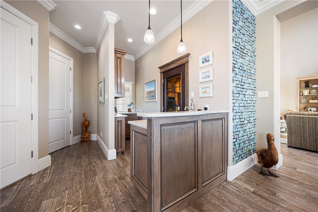13806 Captains Row Corpus Christi, TX 78418 - Photo 10 of 40 a view of a kitchen from the hallway