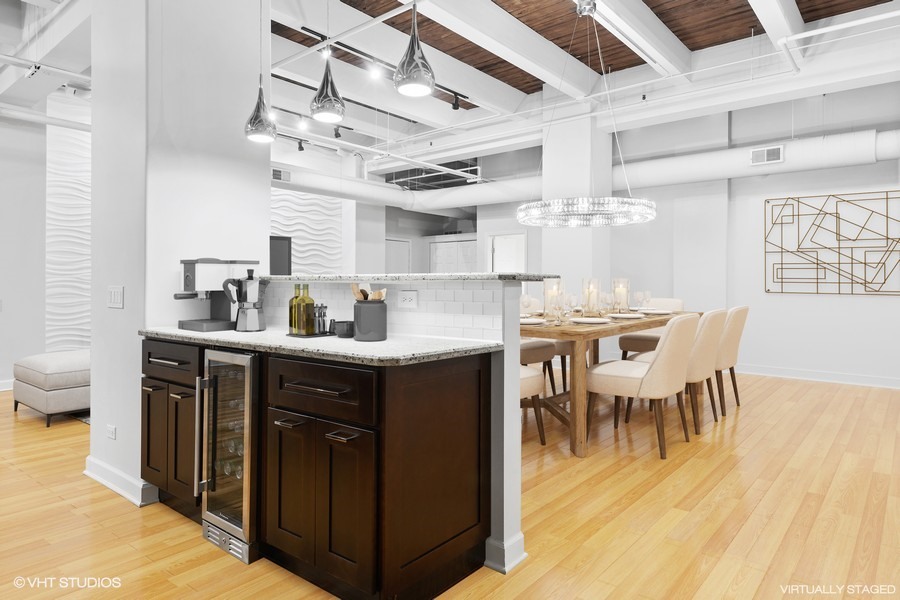 312 North May Street, Unit 2IJ Chicago, IL 60607 - Photo 3 of 19 a kitchen with stainless steel appliances granite countertop a sink and cabinets