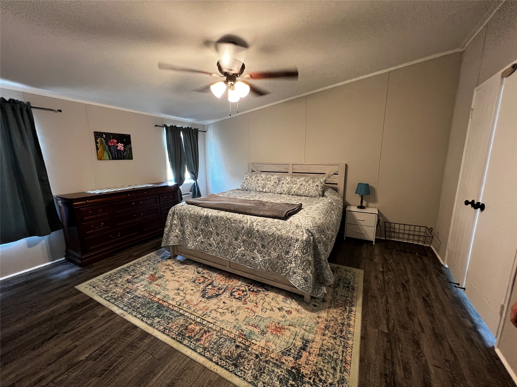 2346 Pr 1105 Midway, TX 75850 - Photo 16 of 25 a bedroom with a bed and wooden floor