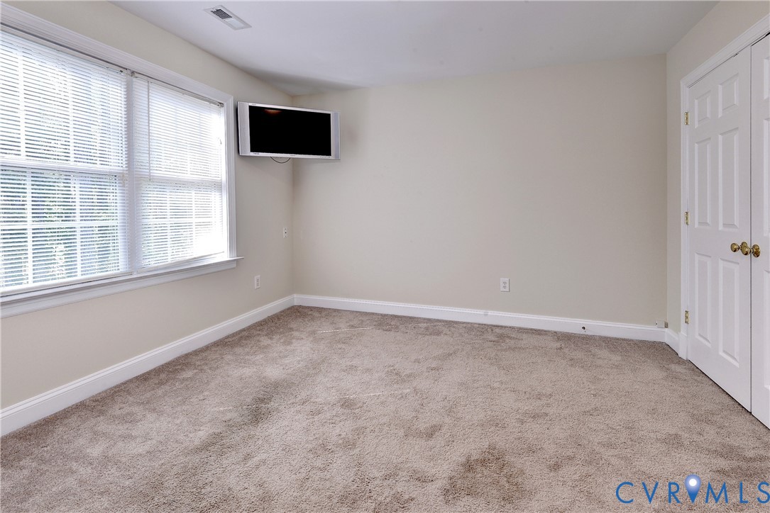 11385 Winding River Road Providence Forge, VA 23140 - Photo 31 of 43 an empty room with a window