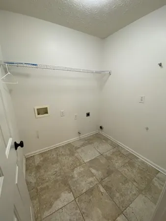 a view of a room with a fireplace