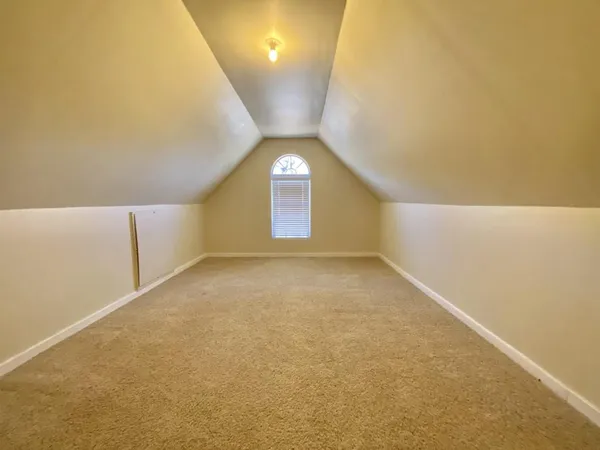 a view of livingroom with window and hardwood floor