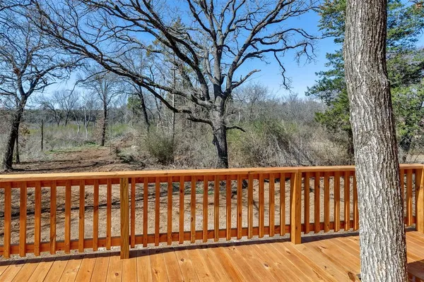 a view of a wooden fence