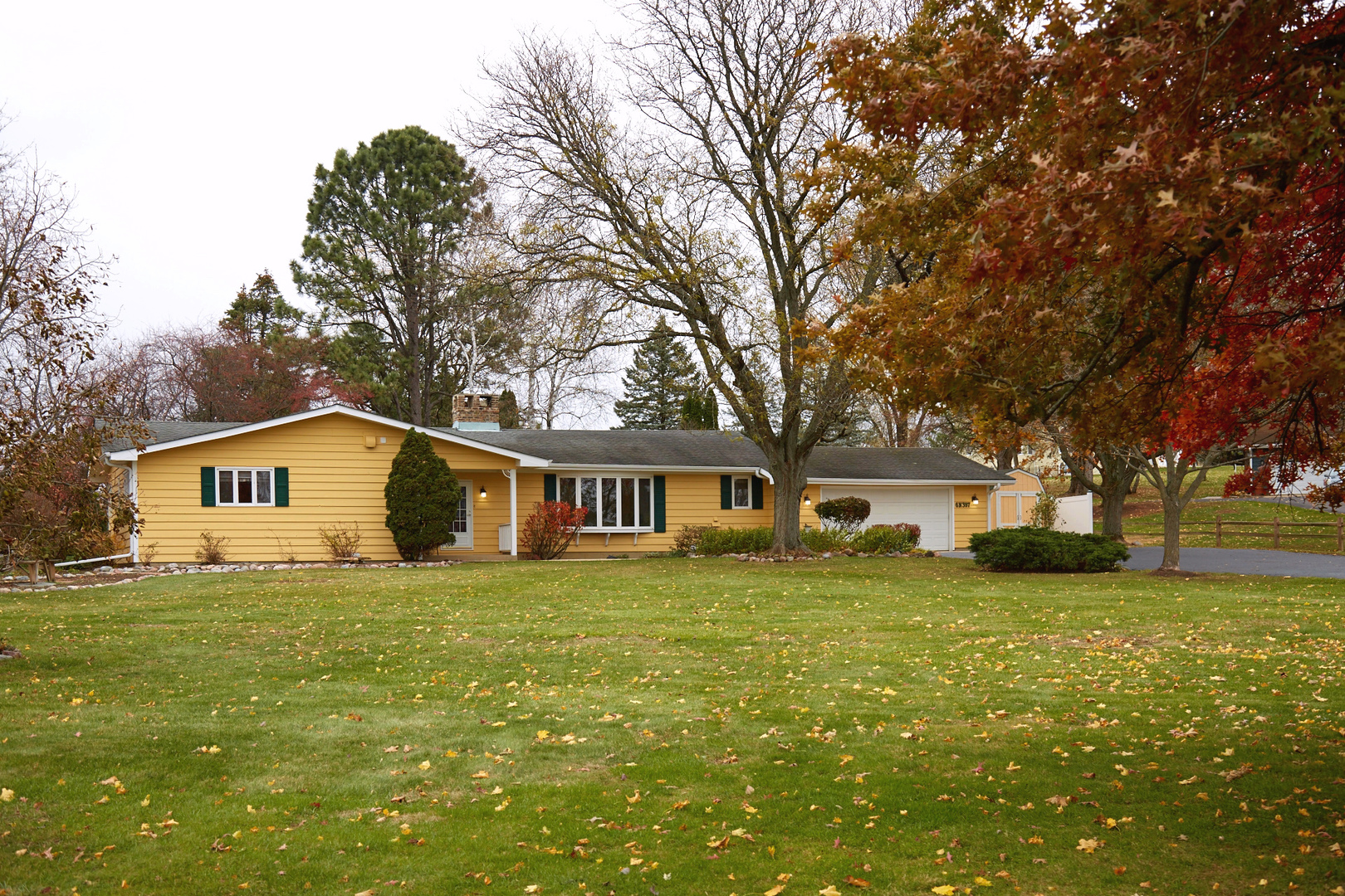6N397 Corron Road St. Charles, IL 60175 - Photo 11 of 29 a front view of a house with a garden