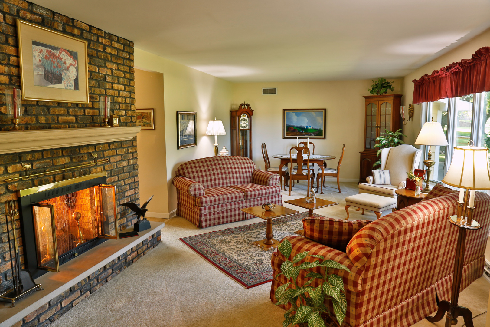 6N397 Corron Road St. Charles, IL 60175 - Photo 12 of 29 a living room with furniture a fireplace and a flat screen tv