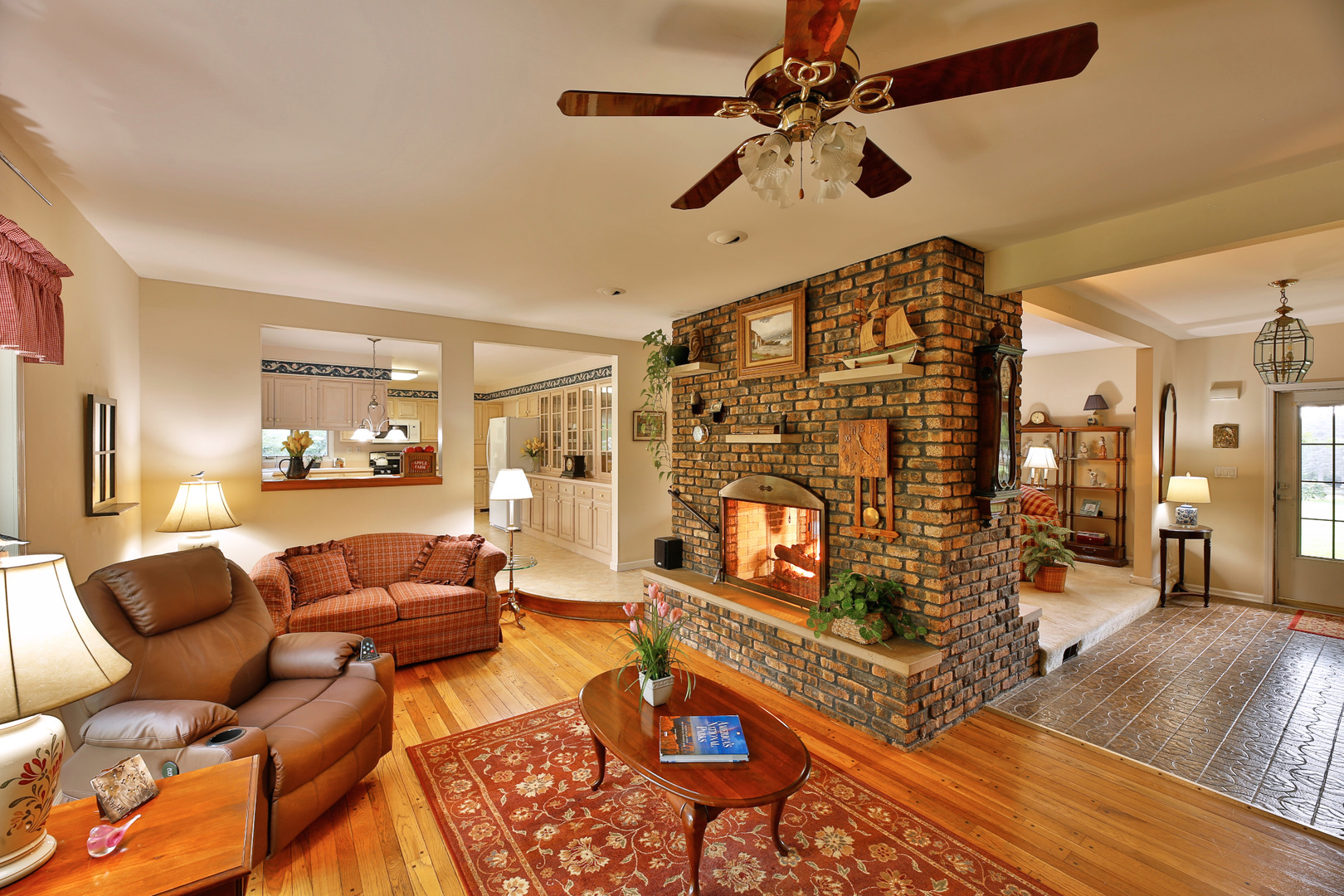 6N397 Corron Road St. Charles, IL 60175 - Photo 15 of 29 a living room with furniture and a fireplace