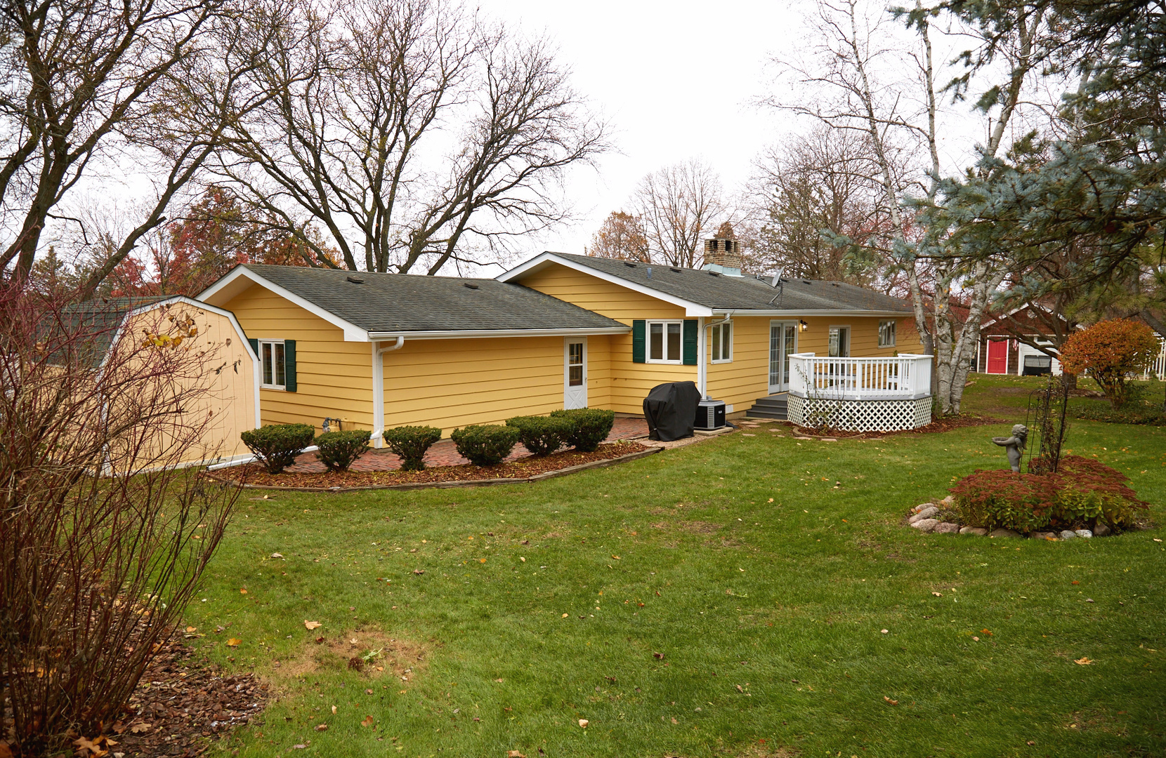 6N397 Corron Road St. Charles, IL 60175 - Photo 24 of 29 a front view of a house with a garden and yard