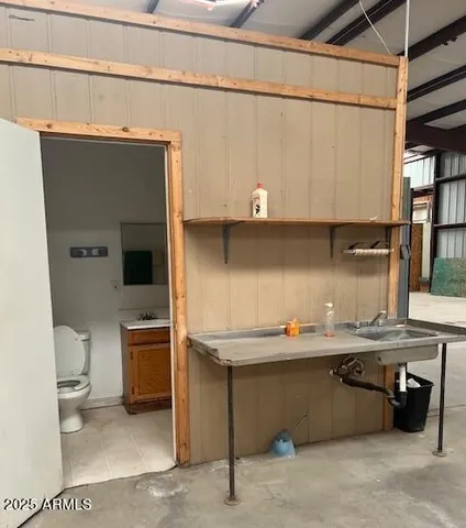 a bathroom with a sink and a toilet
