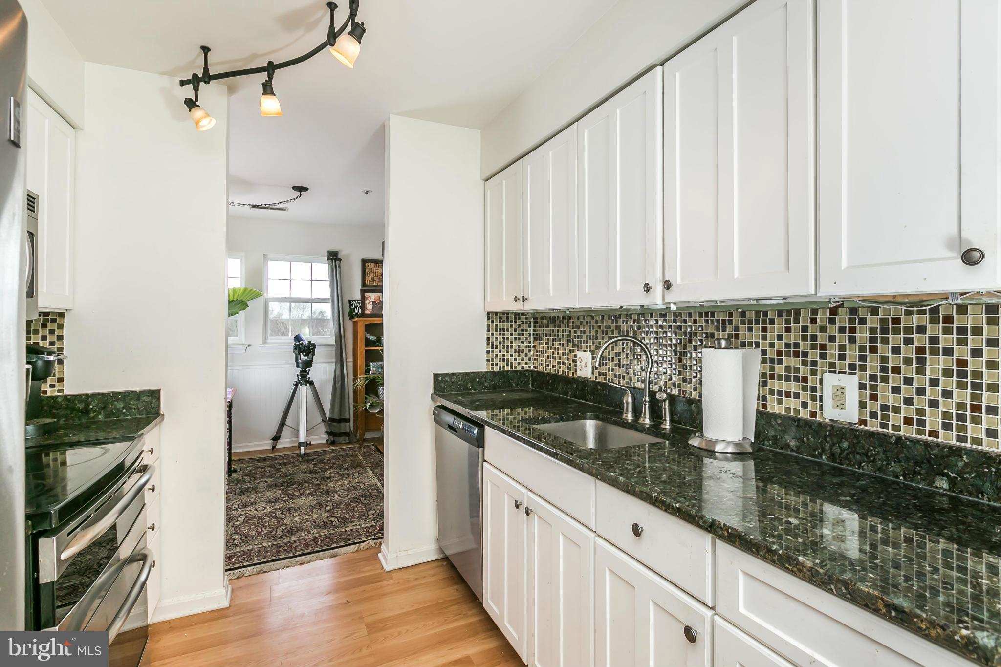 8501 Falls Run Road, Unit L Ellicott City, MD 21043 - Photo 3 of 24 How gorgeous is that backsplash??