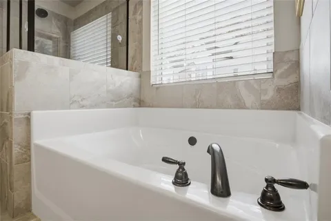 a close view of utility room with washer and dryer