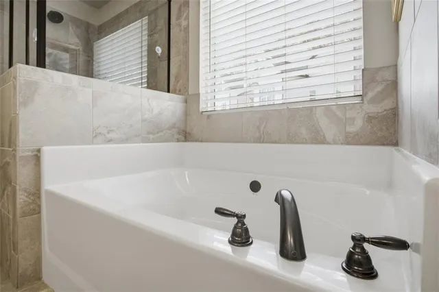 a close view of utility room with washer and dryer