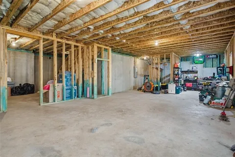 a balcony with wooden floor and outdoor seating