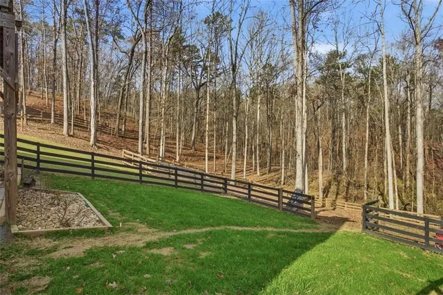 a view of a balcony with table and chairs