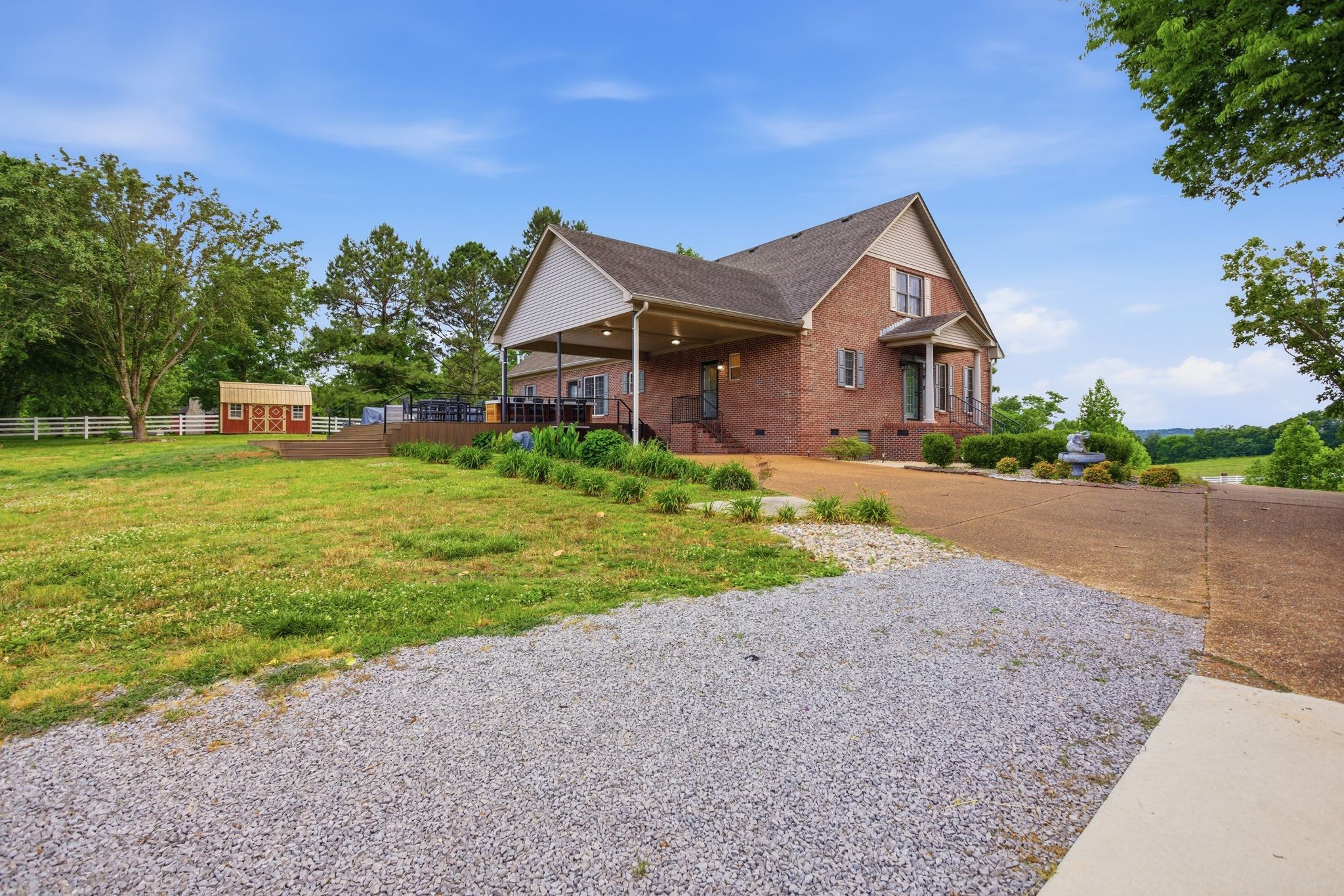 1150 Cochran Cemetery Road Lewisburg, TN 37091 - Photo 46 of 63 a front view of a house with yard and green space