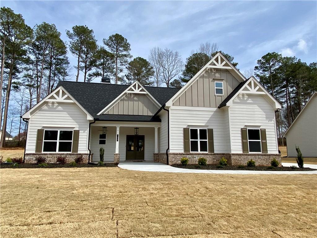 198 Meadows Drive Bethlehem, GA 30620 - Photo 1 of 1 a front view of a house with a yard