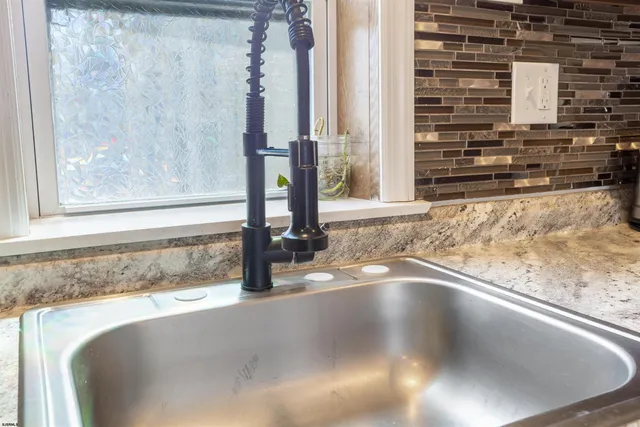 a kitchen with a stove and a microwave