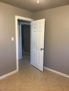 an empty room with closet