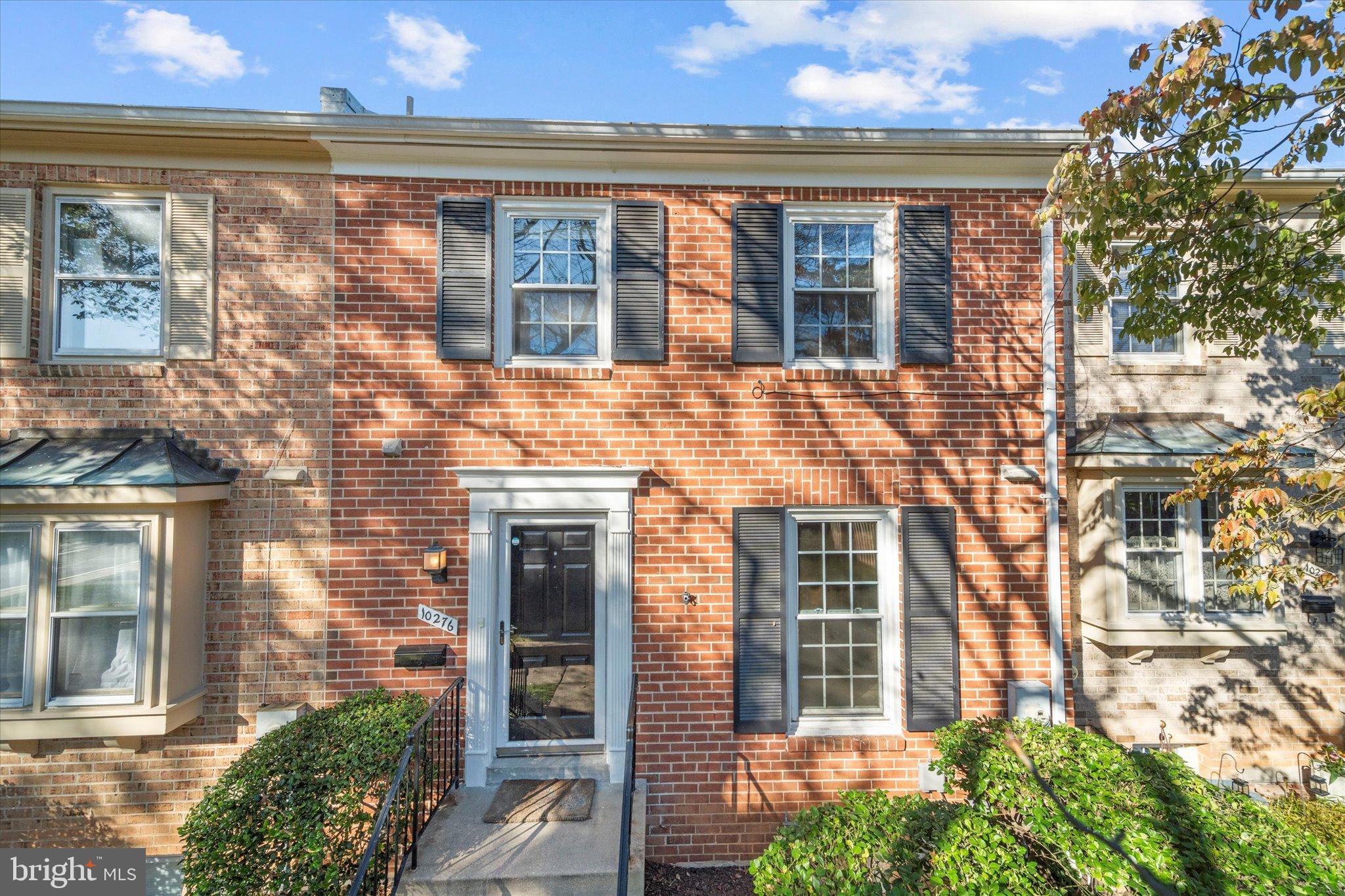 10276 Arizona Circle, Unit 61 Bethesda, MD 20817 - Photo 1 of 42 a brick building with a large windows