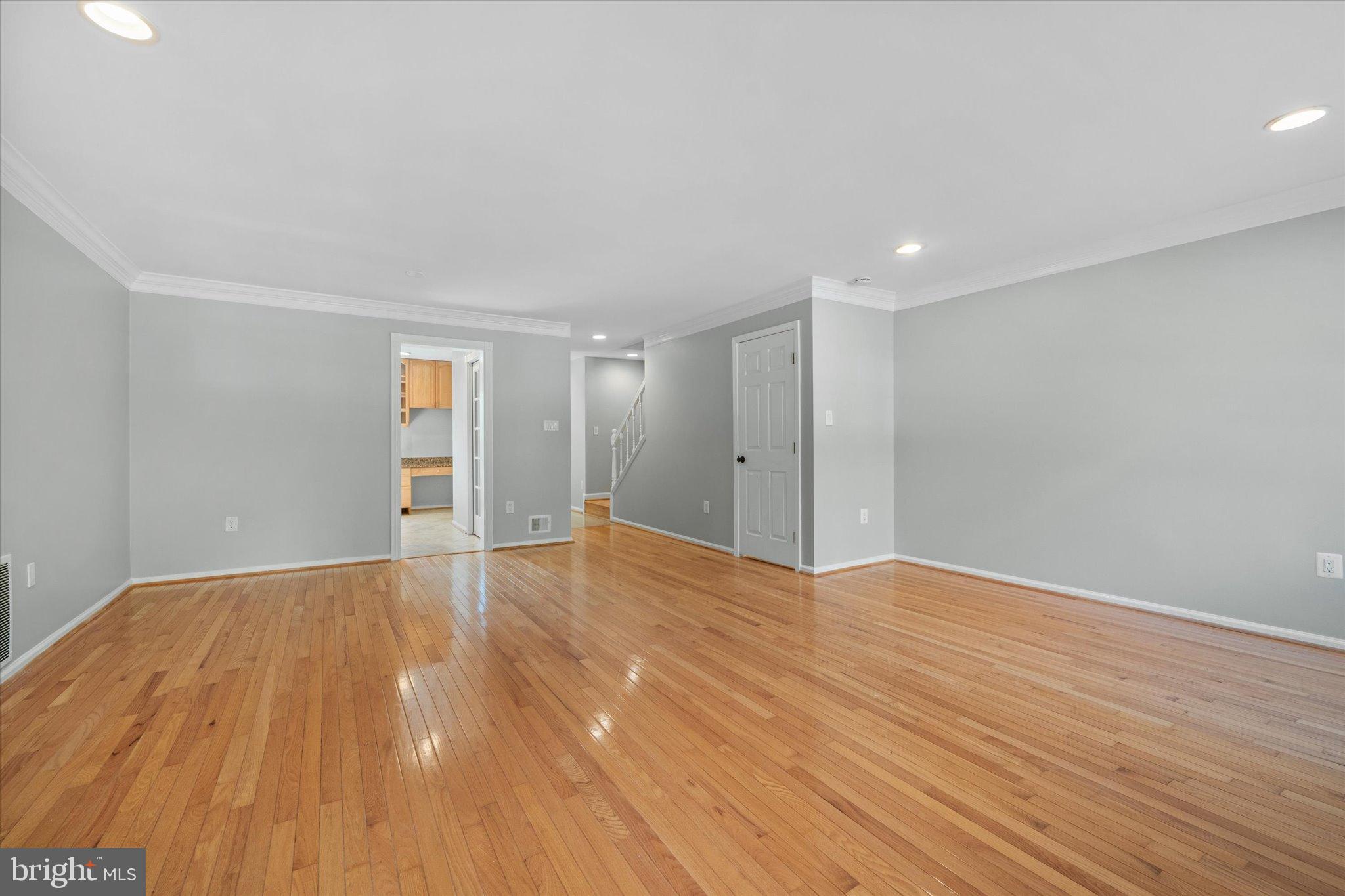 10276 Arizona Circle, Unit 61 Bethesda, MD 20817 - Photo 11 of 42 a view of empty room with wooden floor