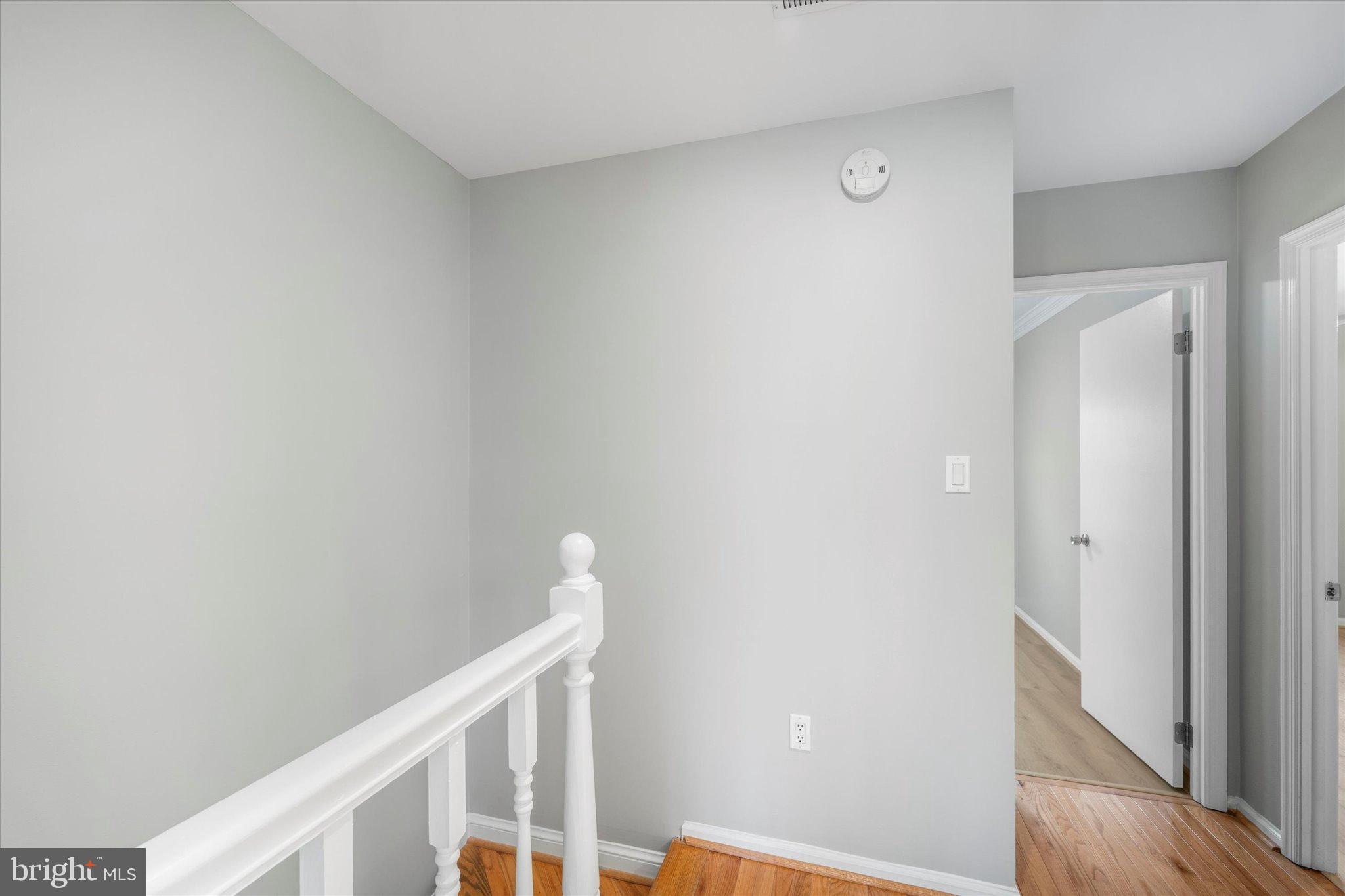 10276 Arizona Circle, Unit 61 Bethesda, MD 20817 - Photo 15 of 42 a view of stairs and an empty room
