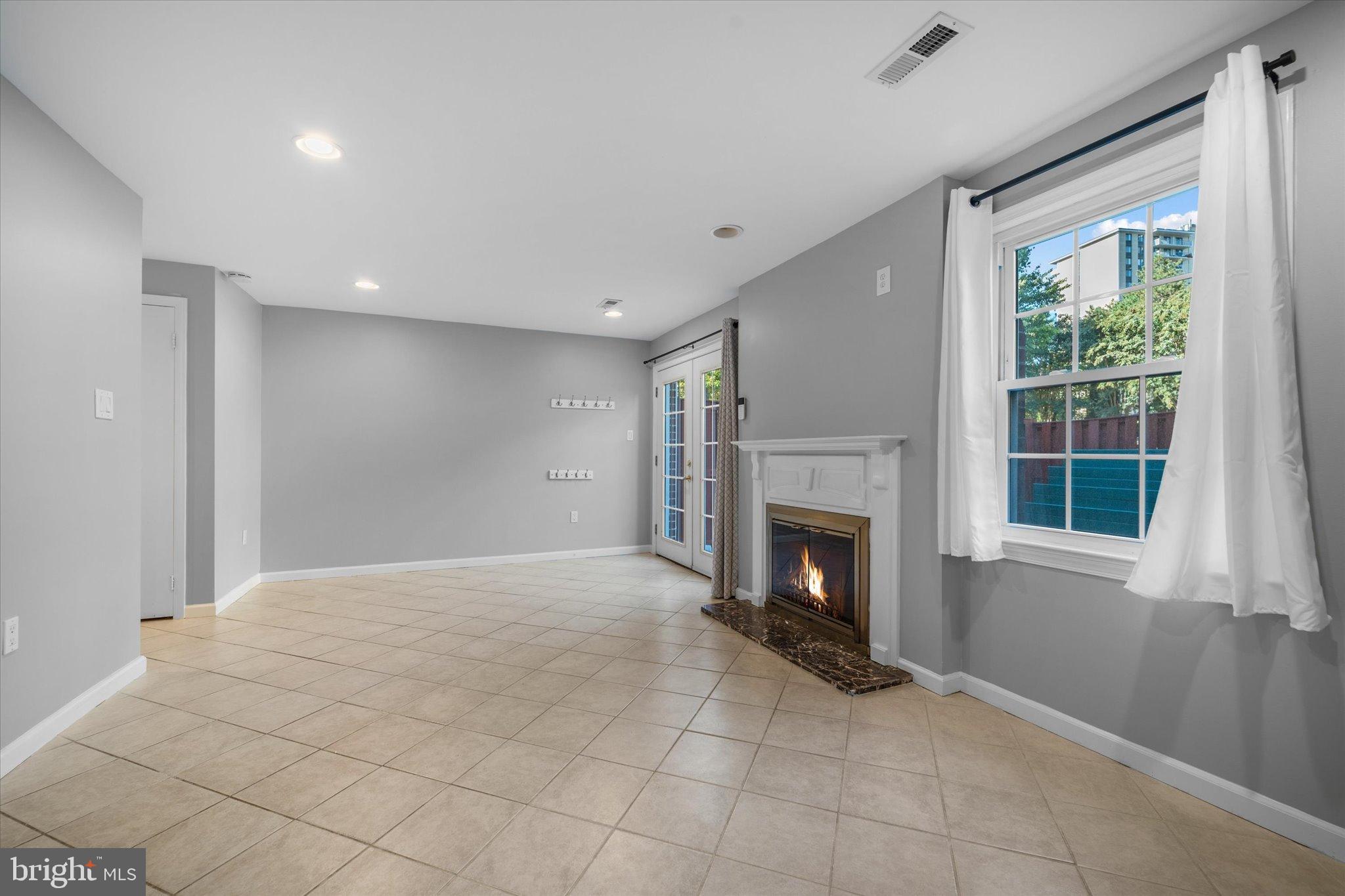 10276 Arizona Circle, Unit 61 Bethesda, MD 20817 - Photo 29 of 42 a view of an empty room with a window