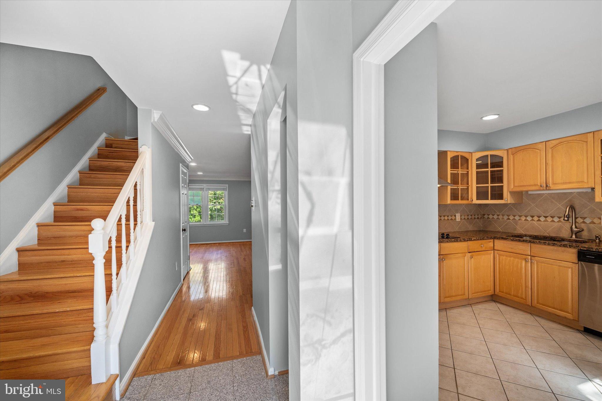 10276 Arizona Circle, Unit 61 Bethesda, MD 20817 - Photo 4 of 42 a view of a kitchen cabinets and wooden floor