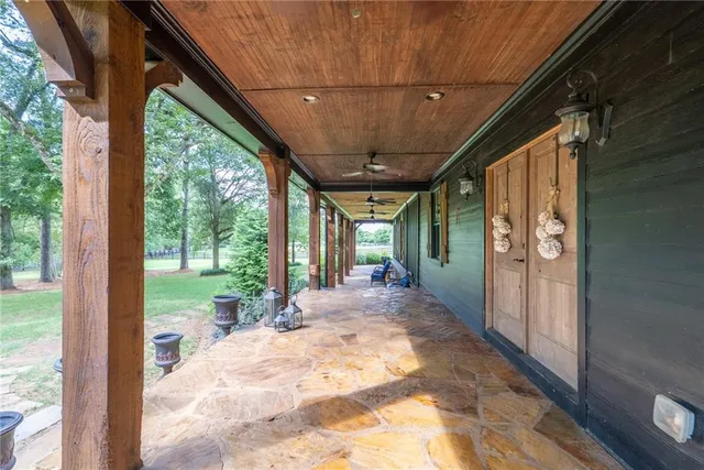 a kitchen with lots of counter top space and dining table