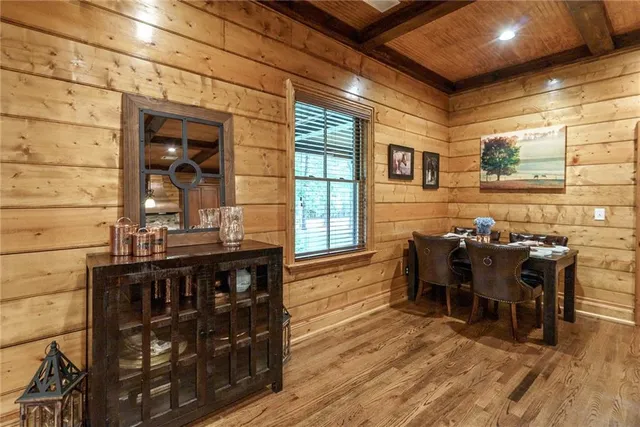 a living room with a flat screen tv and a fireplace