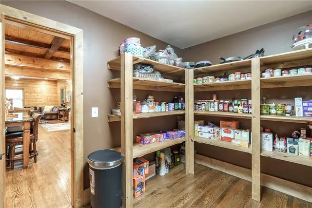 a spacious bathroom with a bathtub and shower