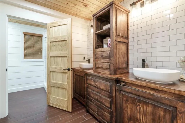 a backyard of a house with barbeque oven