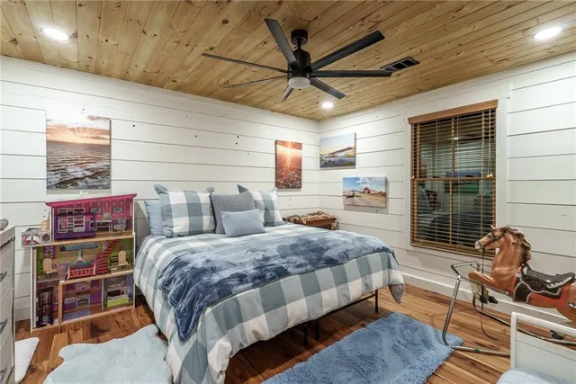 a view of parking garage with cars